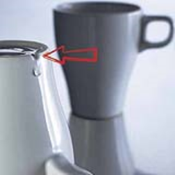 A notch at the bottom of a mug helps the water drain off in a dish washer
