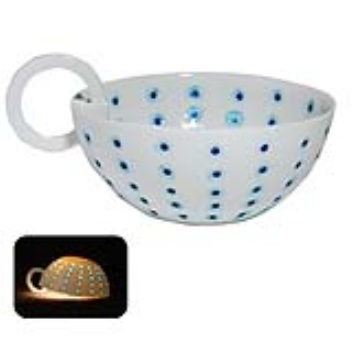 "Inside-outside" teacup with glazed spots