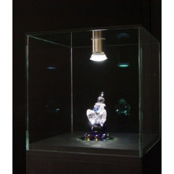 A pane of transparent glass conducts electricity through the conductive circuits on top of the glass