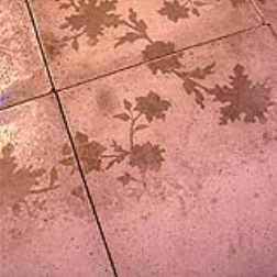 Solid Poetry is a concrete tile that reacts to water and reveals images or patterns