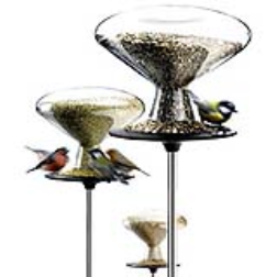 This bird feeder dispenses the food as it is consumed by the bird