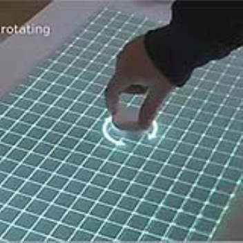 This table uses cameras underneath to track the movements
