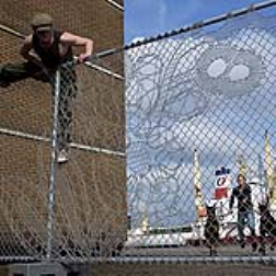 A chain link fence is deconstructed and rewoven into a classic bobbin-lace motif