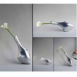 The vase's equilibrium is balanced in such a way that when water evaporates, it will slowly start to tilt downward