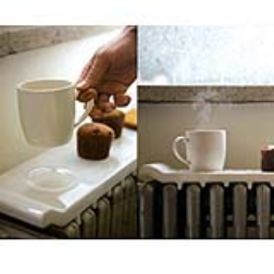 Ceramic tray for a cup which fits on top of a radiator