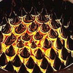 Ferrofluids are made from microscopic iron particles and react to magnetic fields