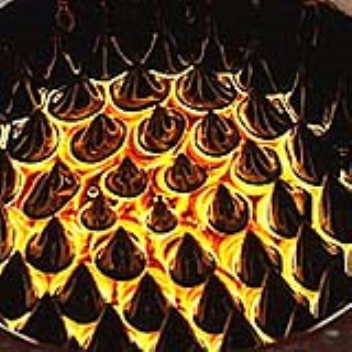 Ferrofluids are made from microscopic iron particles and react to magnetic fields