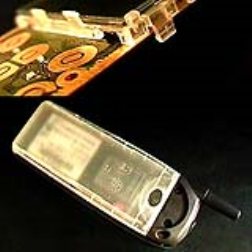 Heat applied to a mobile phone will activate the shape memory alloy (SMA) and open the mobile phone cover