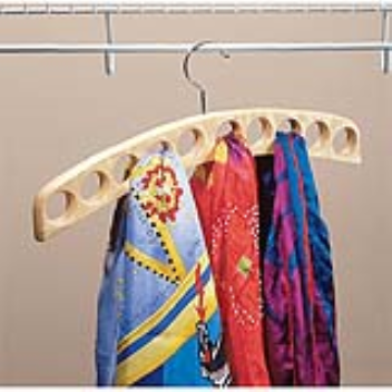 This hanger has holes for hanging scarves