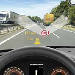 This in car device looks for and reads road signs and acts upon them