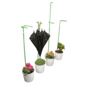 A planter that not only doubles as an umbrella stand, but also makes use of the drops on the umbrella to water the plants