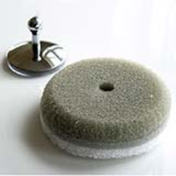 A kitchen sponge with a hole in the center can be hung up with a suction cup attachment