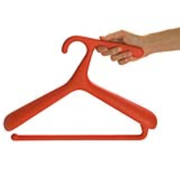 Adding a simple handle to a coat hanger makes it easier to hold when placing the hanger in the cupboard