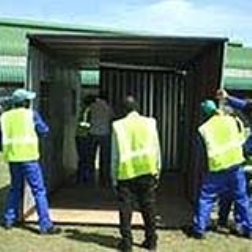 This "fold-away house" is easily transportable and easily erected as a temporary shelter in disaster areas