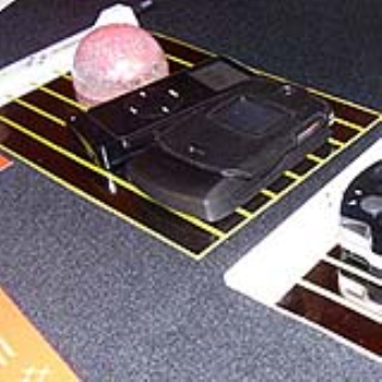 This thin pad uses induction to charge your electronic devices