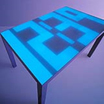 Electro-luminescent film on a table will turn the entire surface into a clock