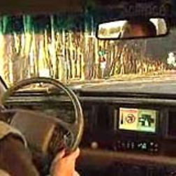 Transmitters along the road beam up wireless signals to a receiver on the car and alert the driver