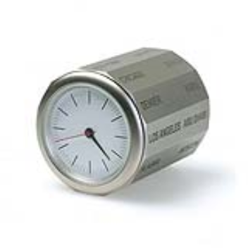 This clocks has 12 slides, each with the name of two major cities, representing the 24 global time zones