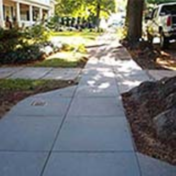 Rubber sidewalks allow air and water to reach the soil below, and can be pulled apart for easy tree and root maintenance