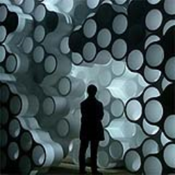The cloud shelving system allows elements to be stacked and aligned to create large bookshelves or room dividers