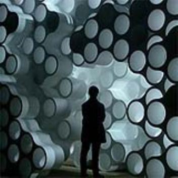 The cloud shelving system allows elements to be stacked and aligned to create large bookshelves or room dividers