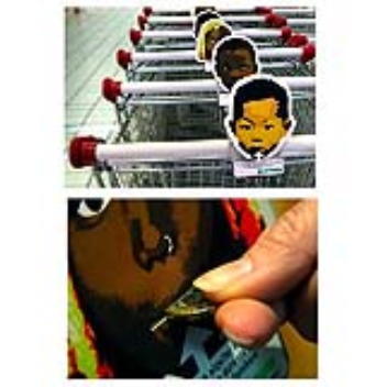 A shopping cart can help charity by using a cardboard face over the coin release