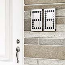 This system for numbering a house has adjustable tabs