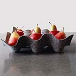 Folds flat for storage and then unfurls to hold coins, keys, fruit, and other small treasures
