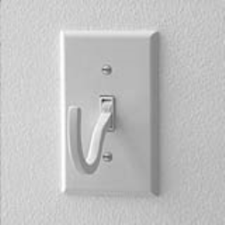 OFF is a light switch that doubles as a place to hang essentials when in the OFF position