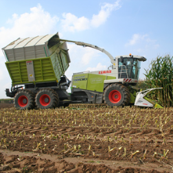 A harvester which has a tilting action for a greater load capacity