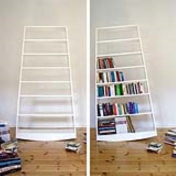 A bookshelf which tilts when books are added