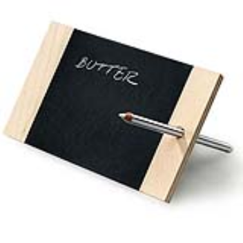 A white chalk pencil supports this mobile memo board